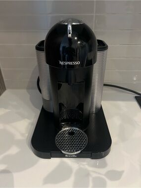 Nespresso Single-Serve Coffee Maker in Black and Silver